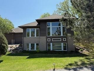 3529 Green Ridge Rd, Minnetonka, MN 55305 - back of house featuring a yard