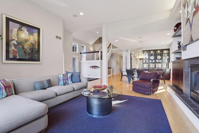 3529 Green Ridge Rd, Minnetonka, MN 55305 - living room with light wood-type flooring, a fireplace, and recessed lighting