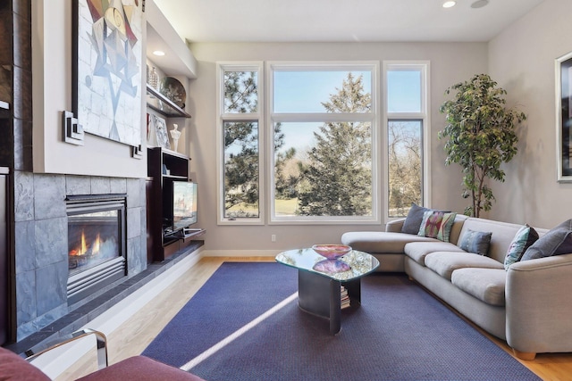 3529 Green Ridge Rd, Minnetonka, MN 55305 - living room with a tiled fireplace, wood finished floors, recessed lighting, and baseboards