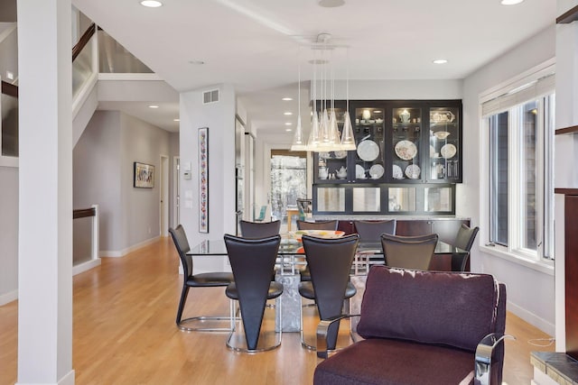 3529 Green Ridge Rd, Minnetonka, MN 55305 - dining area featuring wood finished floors, baseboards, and recessed lighting