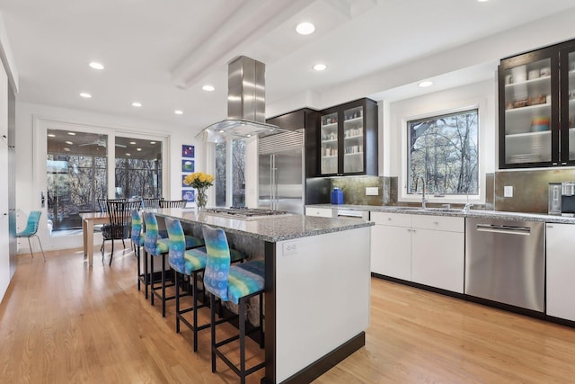 3529 Green Ridge Rd, Minnetonka, MN 55305 - kitchen featuring appliances with stainless steel finishes, a sink, backsplash, stone countertops, and recessed lighting