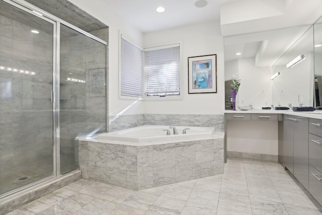 3529 Green Ridge Rd, Minnetonka, MN 55305 - bathroom with a stall shower, vanity, a bath, and marble finish floors