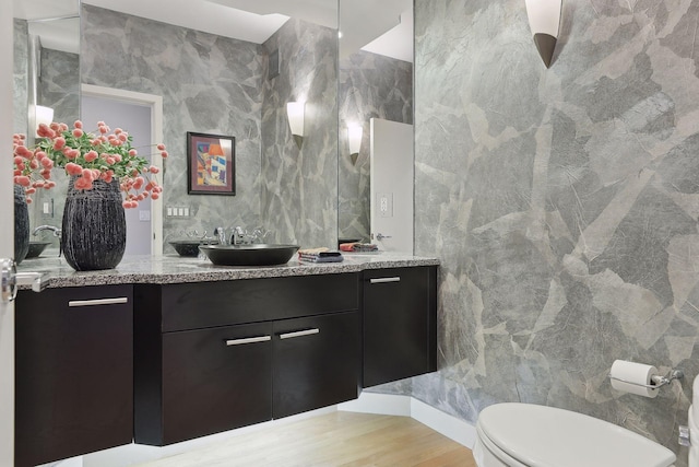 3529 Green Ridge Rd, Minnetonka, MN 55305 - full bath with toilet, vanity, and wood finished floors