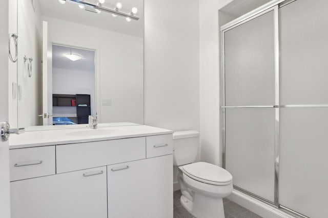 3529 Green Ridge Rd, Minnetonka, MN 55305 - ensuite bathroom with a stall shower, toilet, tile patterned flooring, and vanity