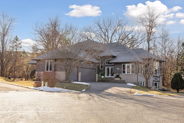 3529 Green Ridge Rd, Minnetonka, MN 55305 - view of front facade featuring driveway, a garage, and french doors