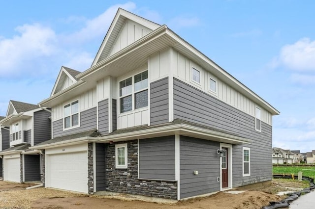 view of side of home with a garage