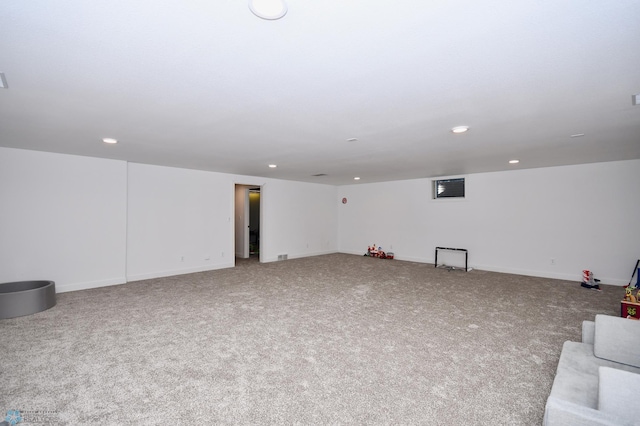 basement featuring carpet flooring