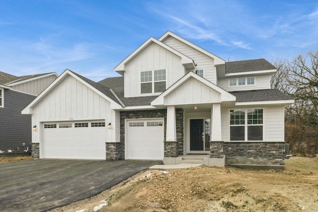 craftsman-style house featuring a garage