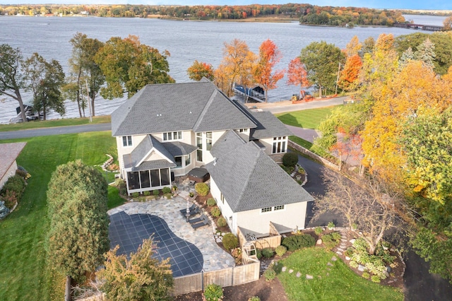 birds eye view of property featuring a water view