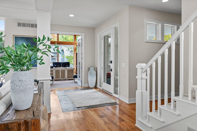 entrance foyer with hardwood / wood-style flooring