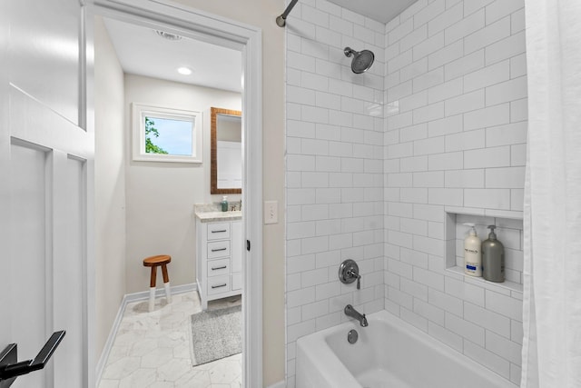 bathroom featuring vanity and shower / bath combo with shower curtain