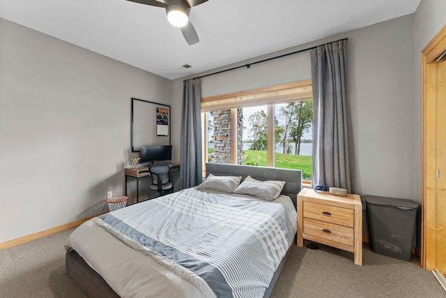 bedroom featuring ceiling fan and carpet flooring