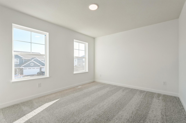 unfurnished room with carpet