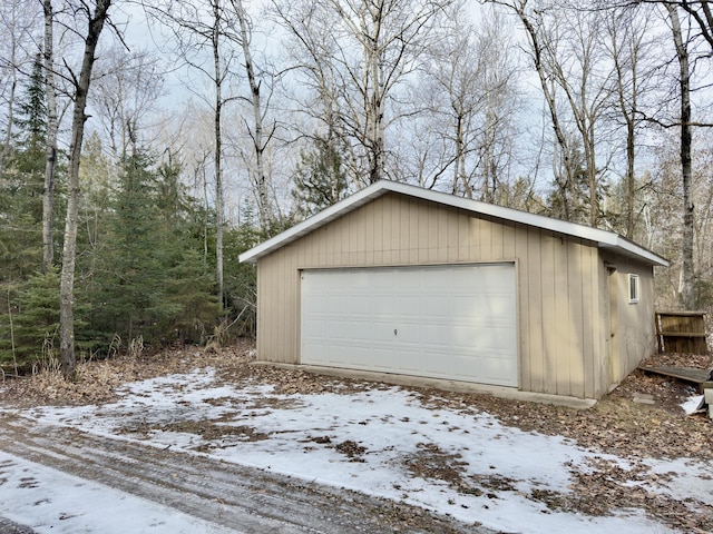 view of snow covered garage