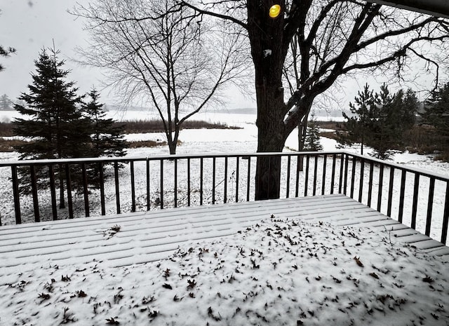 view of snow covered deck