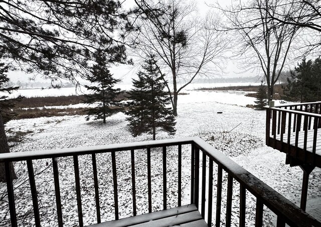 view of snow covered deck