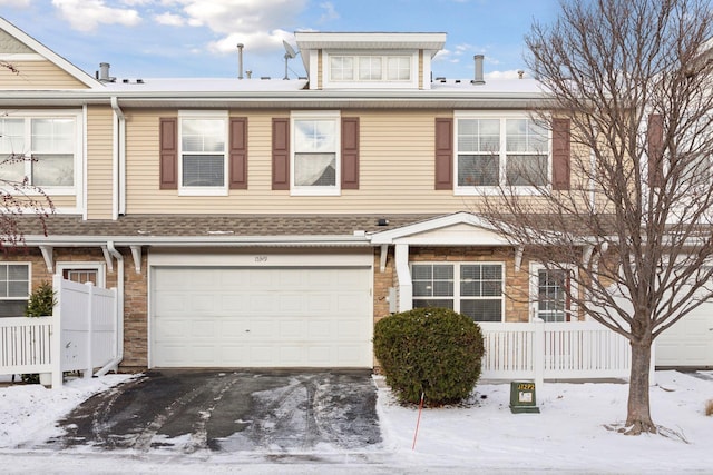 view of front of home with a garage