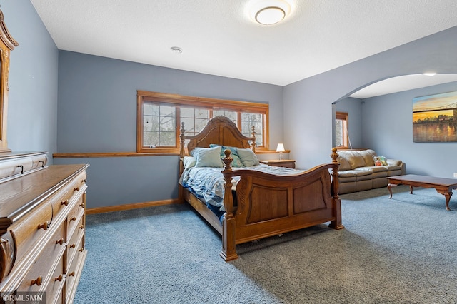 bedroom with dark carpet