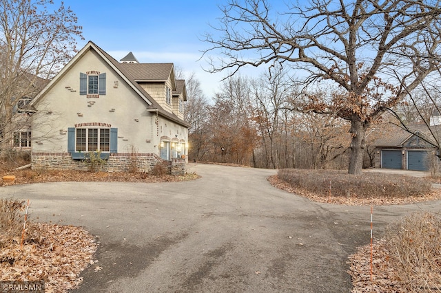 view of property exterior with a garage