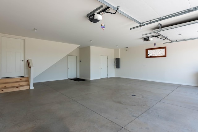 1018 Mahoe Way, Mankato, MN 56001 - garage featuring a garage door opener and electric panel