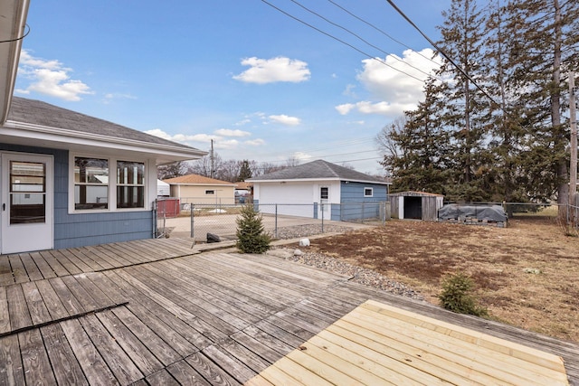 wooden deck with a shed