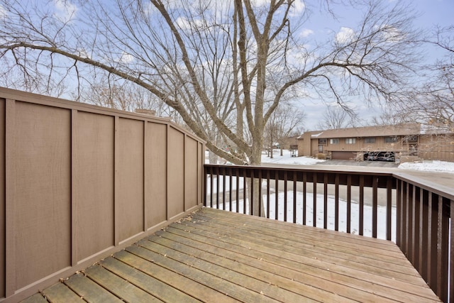 view of snow covered deck