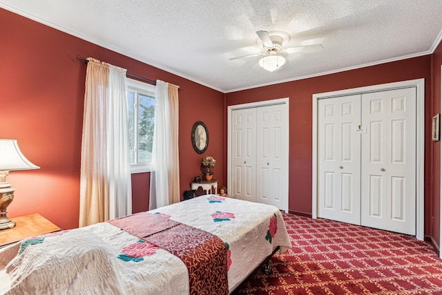 5945 Kellogg Ave, Edina, MN 55424 - carpeted bedroom with two closets, ornamental molding, a textured ceiling, and ceiling fan