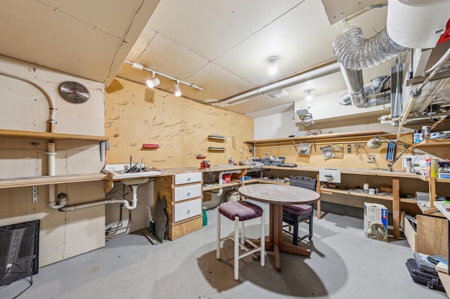 5945 Kellogg Ave, Edina, MN 55424 - miscellaneous room featuring a workshop area and concrete floors
