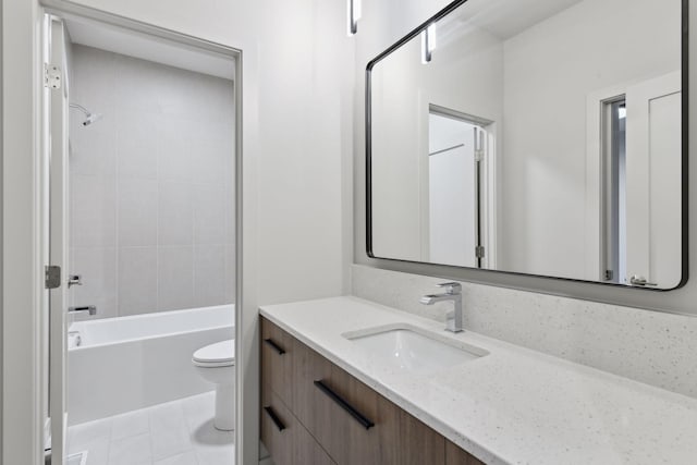 full bathroom with shower / bath combination, tile patterned flooring, toilet, and vanity