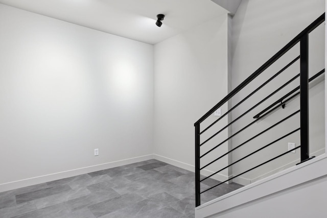 stairs featuring baseboards