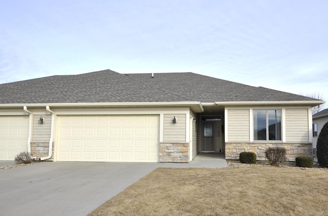 ranch-style home with a garage