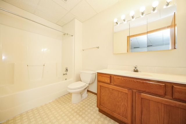 full bathroom featuring bathing tub / shower combination, vanity, and toilet