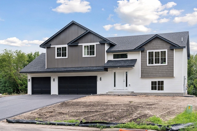 view of front of property with a garage