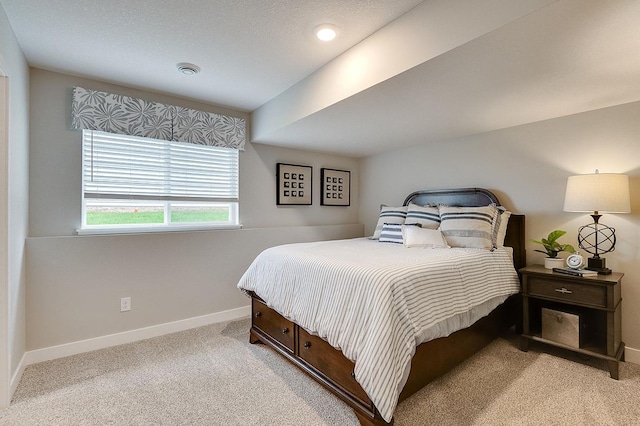 bedroom with light colored carpet