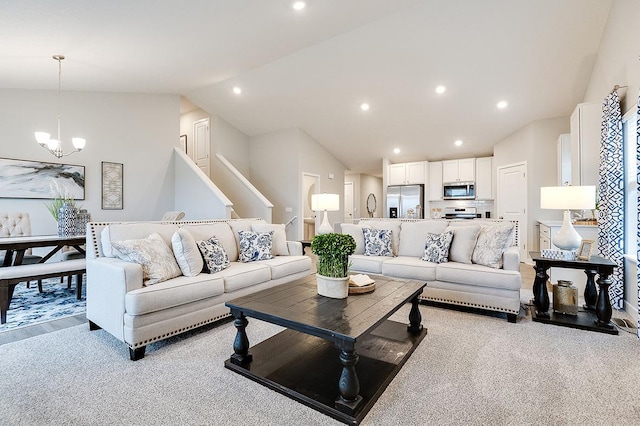 5181 Mustang Ct, Woodbury, MN 55129 - living room with lofted ceiling, a chandelier, light colored carpet, and recessed lighting