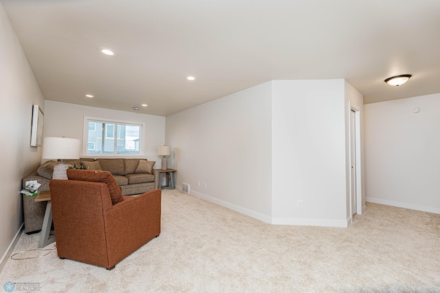 living room with light colored carpet