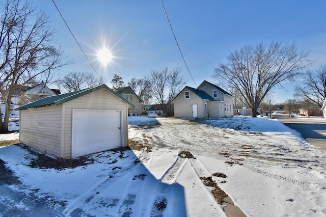 303 Alexandria St NW, Evansville, MN 56326 - exterior space featuring a garage and an outdoor structure