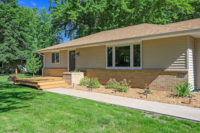 ranch-style home with a front yard