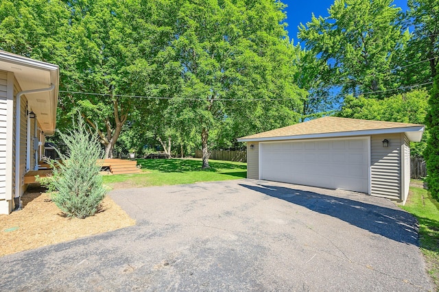 garage with a lawn