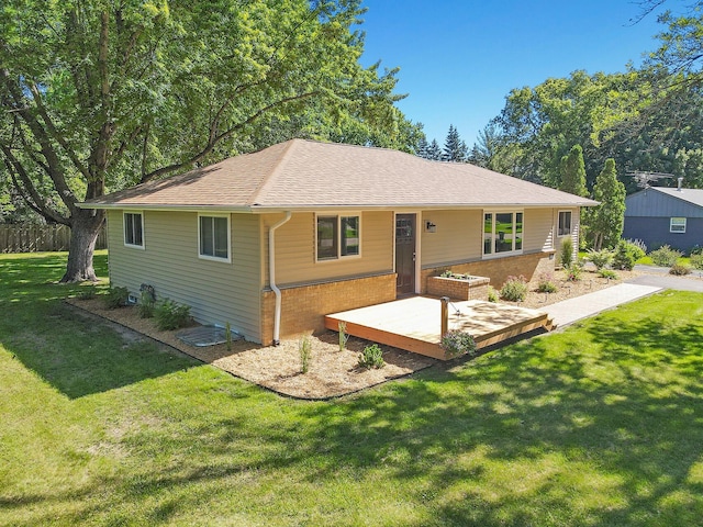 single story home with a front yard