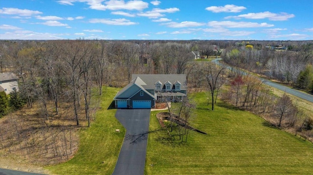 24455 Crocus St NW, Saint Francis, MN 55070 - drone / aerial view with a wooded view
