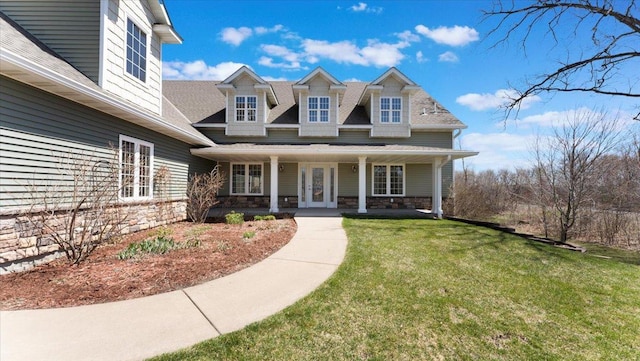 24455 Crocus St NW, Saint Francis, MN 55070 - view of front facade with a porch, french doors, a front lawn, a shingled roof, and stone siding