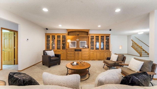 24455 Crocus St NW, Saint Francis, MN 55070 - living room with recessed lighting, baseboards, light colored carpet, and stairway
