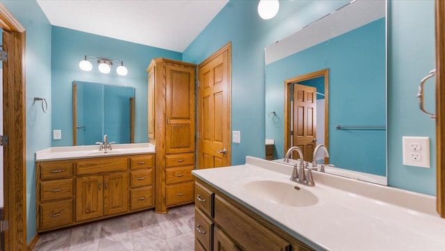 24455 Crocus St NW, Saint Francis, MN 55070 - full bath featuring a sink and two vanities