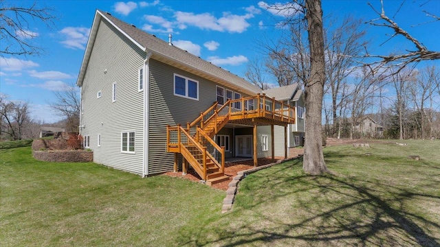 24455 Crocus St NW, Saint Francis, MN 55070 - rear view of house featuring stairs, a lawn, and a wooden deck