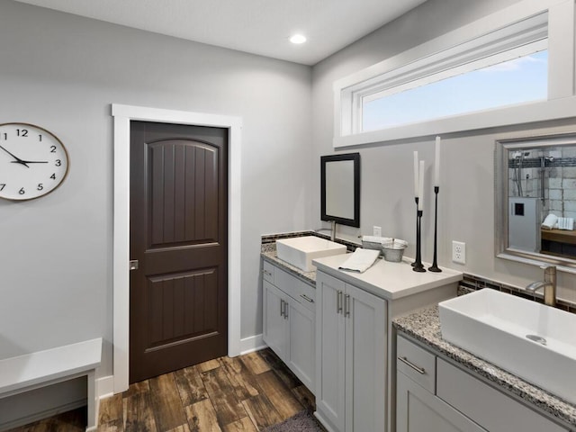 bathroom featuring vanity and hardwood / wood-style flooring