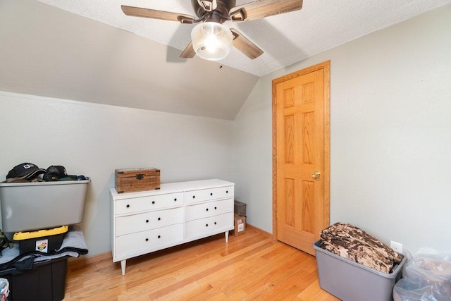 interior space with lofted ceiling and light wood-type flooring