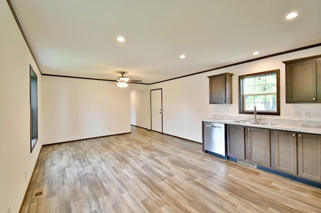 kitchen with ceiling fan, dishwasher, sink, dark brown cabinets, and light wood-type flooring