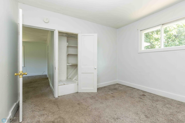 unfurnished bedroom featuring carpet