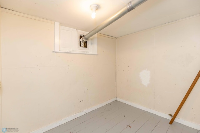 basement with light wood-type flooring